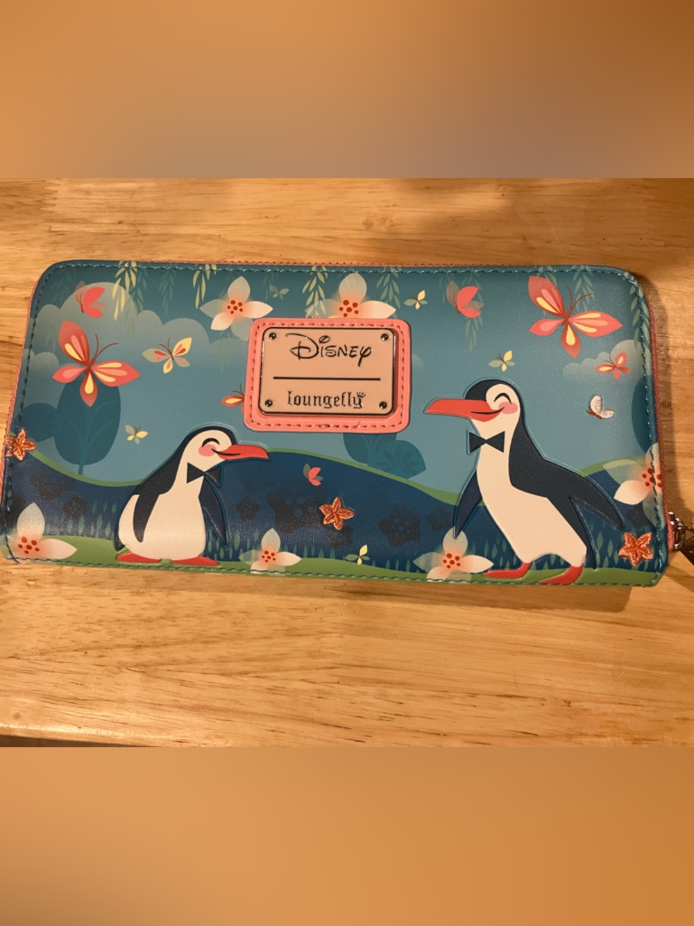 Loungefly Blue Floral Penguin Zip Wallet with Pink Logo Plaque
